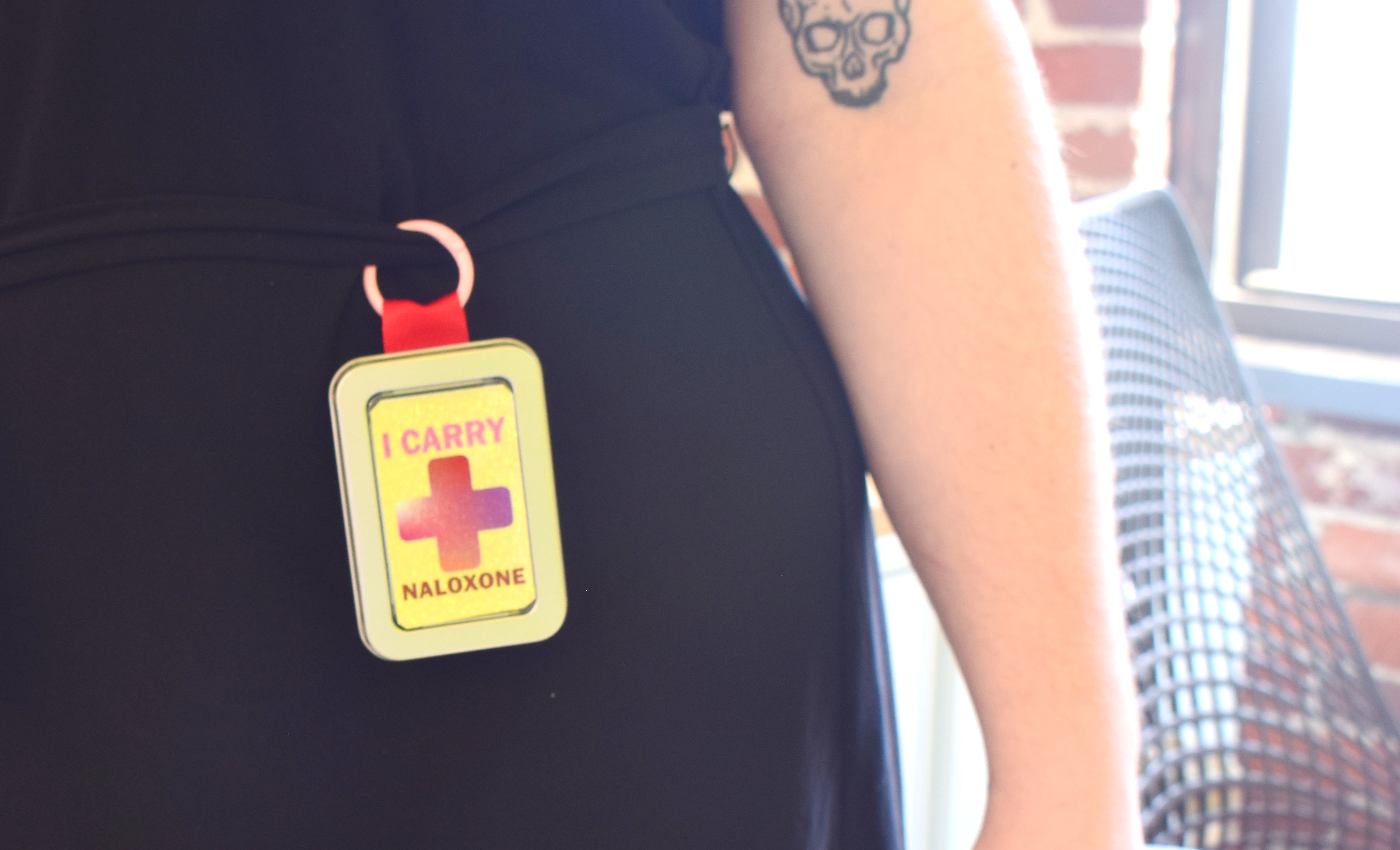 image of narcan container being worn by community design participant